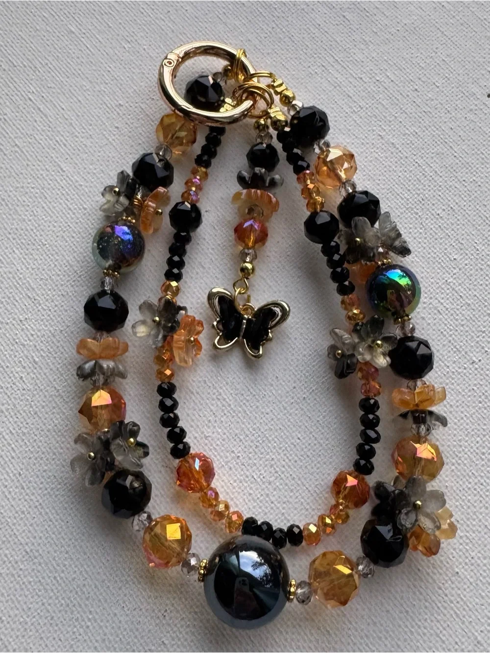 Handmade Black and Orange Beaded with Butterfly Charm
